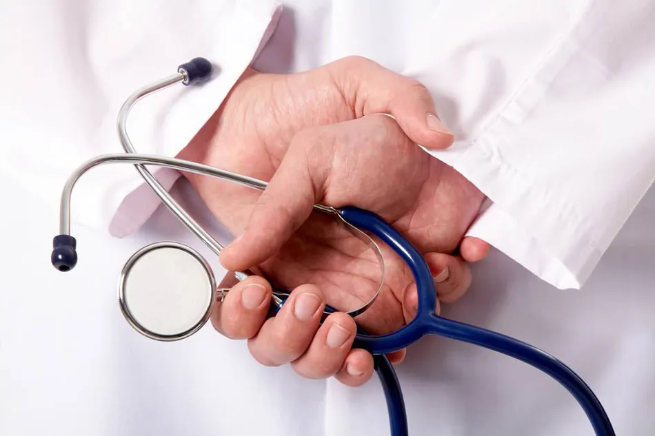 doctor hand holding stethoscope