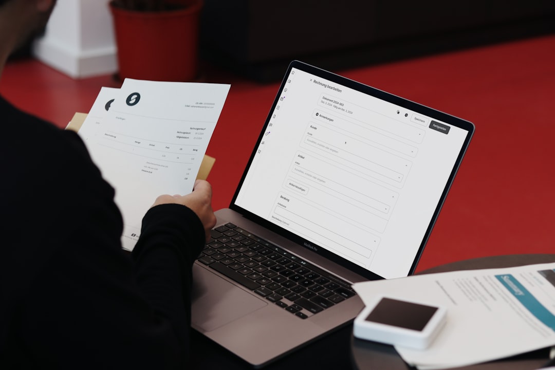 Person using laptop for online bill payment